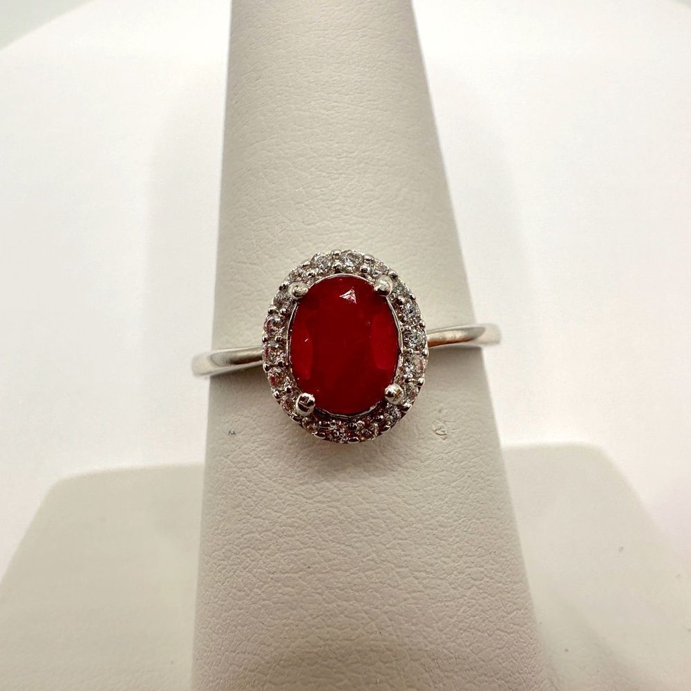 .88ct genuine ruby, cz halo diamond accents, stamped s925 (plated) ring!